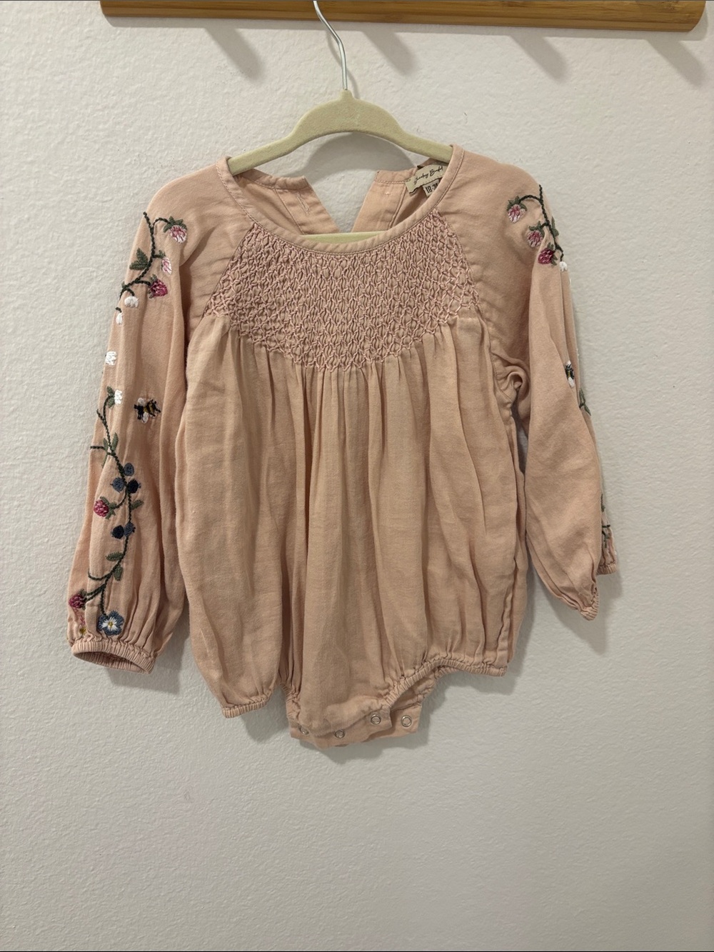 Embroidered Blush Pink Smocked Baby Bodysuit